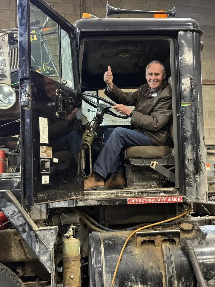 Gaétan at the wheel of a logging truck